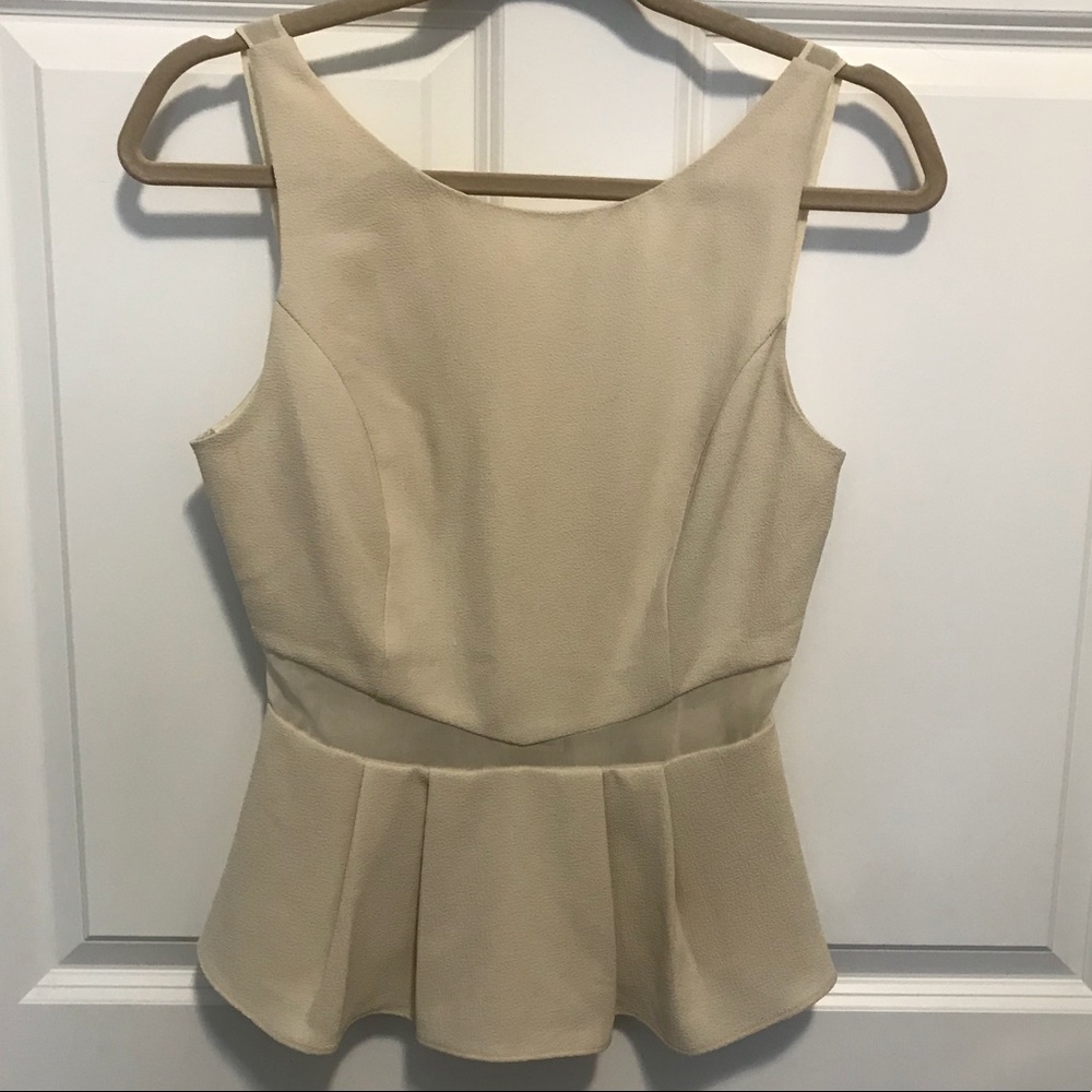 Sleeveless blouse sheer cut out detail